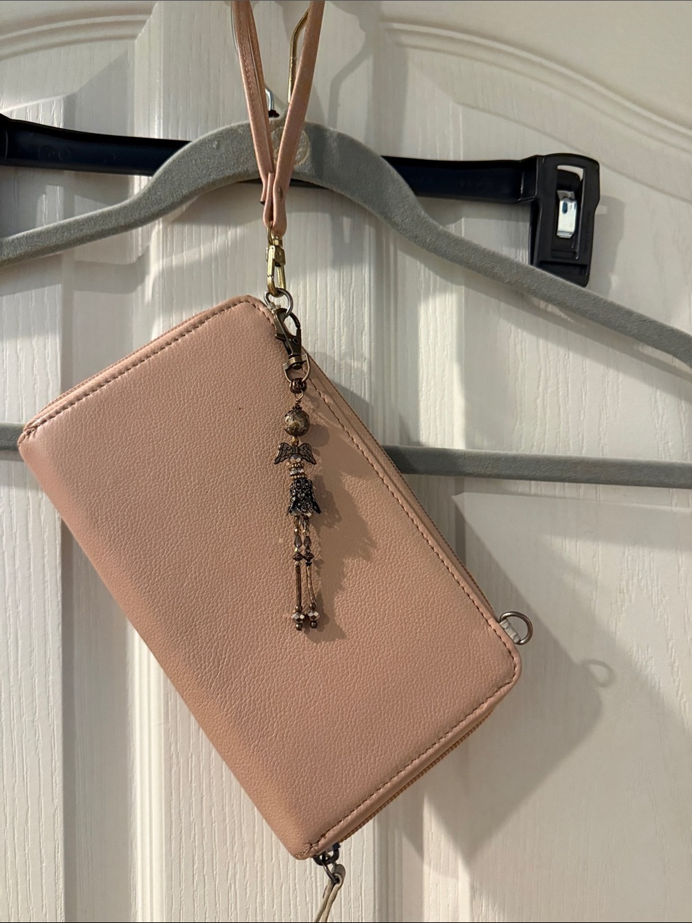 The Sak Pebbled Wristlet Phone Case in Blush Pink